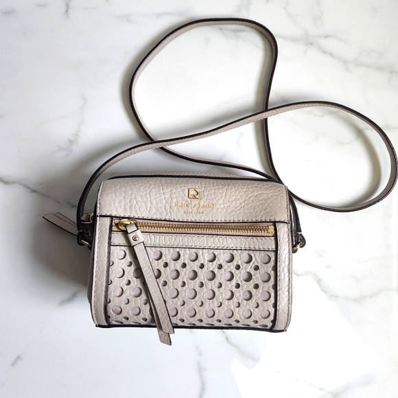 kate spade Handbags - Kate Spade perforated purse tan